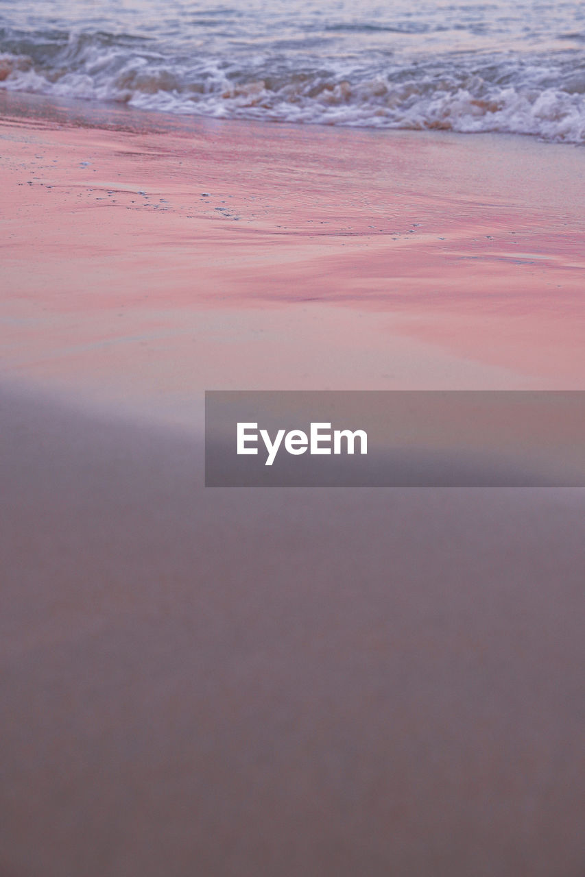 Surface level of beach against sky