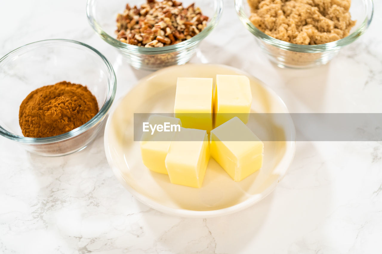 food and drink, food, healthy eating, bowl, wellbeing, ingredient, dish, breakfast, freshness, meal, studio shot, indoors, produce, high angle view, dessert, no people, spice, kitchen utensil, fruit, white background