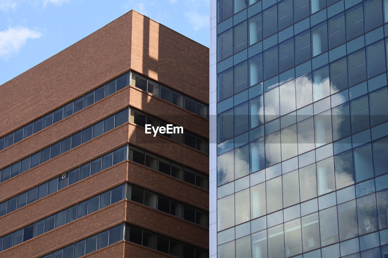 Low angle view of modern building against sky