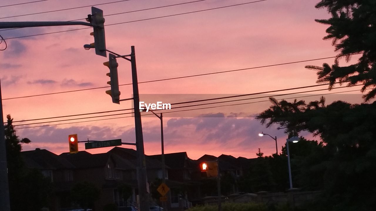 LOW ANGLE VIEW OF POWER LINES AGAINST SKY