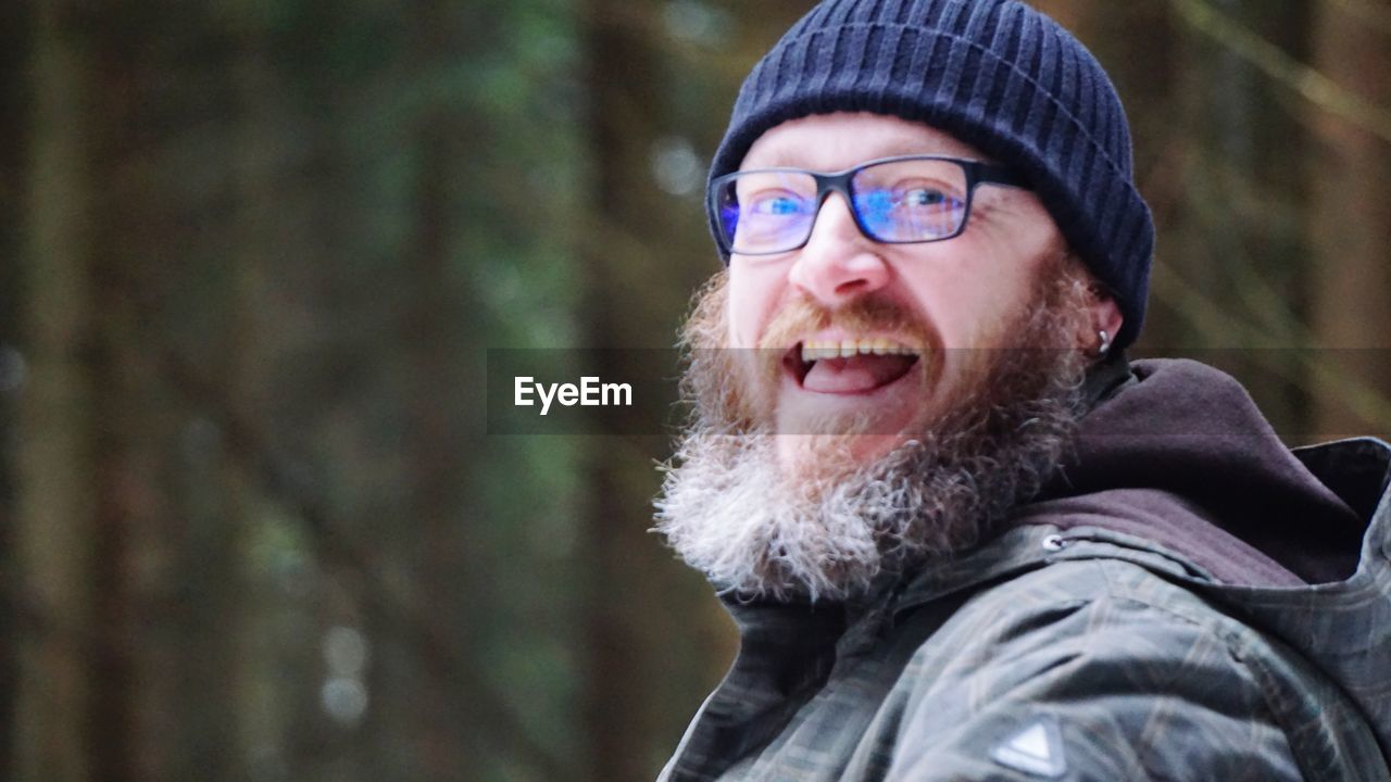 Close-up portrait of man wearing eyeglasses during winter