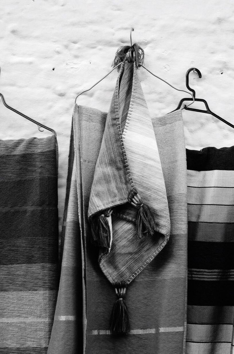 Close-up of clothes hanging on wall