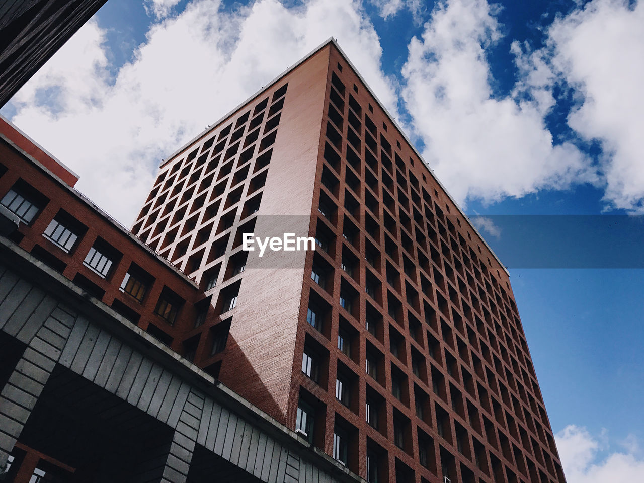 Low angle view of modern building against sky