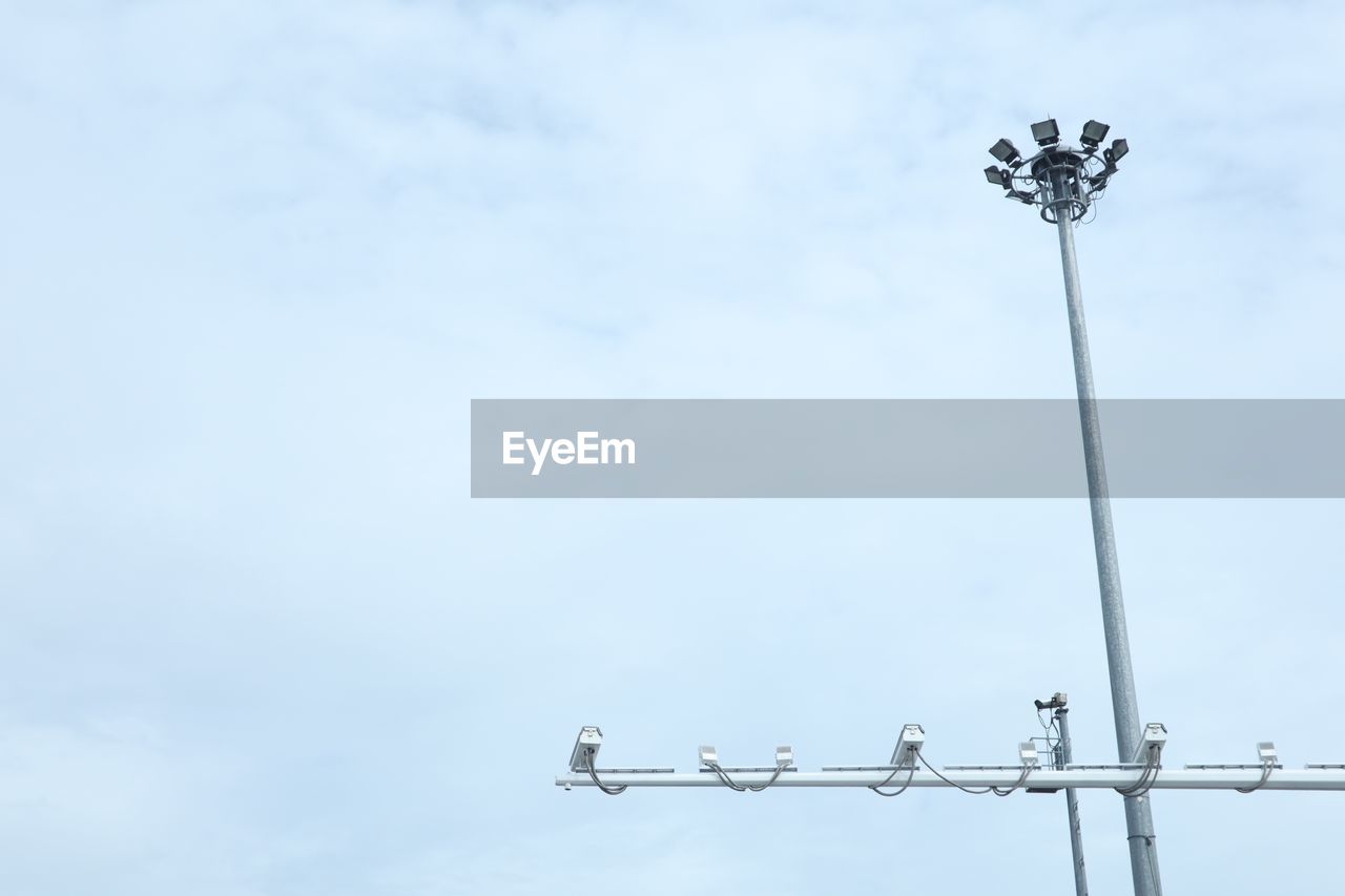 Low angle view of street light against sky