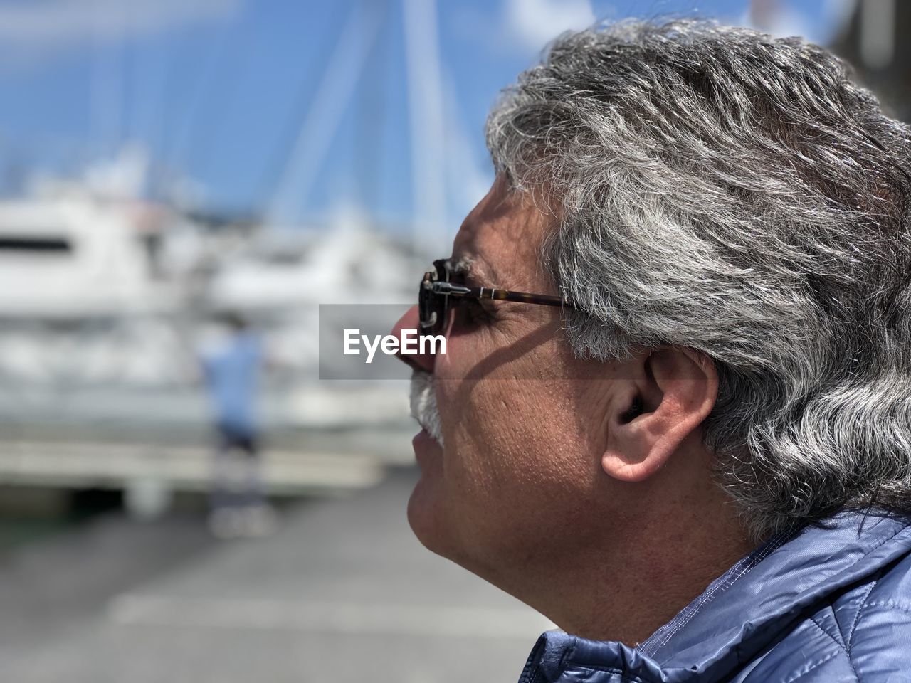 Close-up of man wearing sunglasses during sunny day