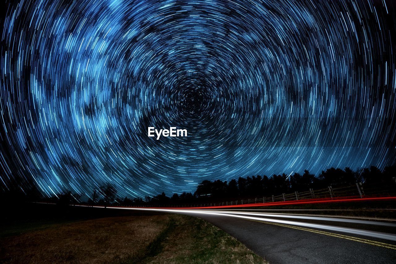 Full frame shot of light trails and star trails