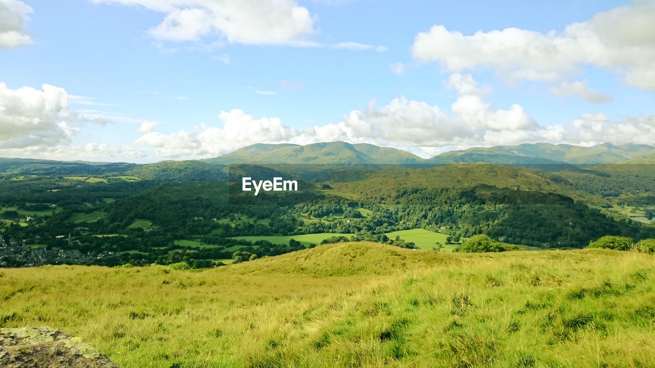 Scenic view of green mountains against sky at english lake district