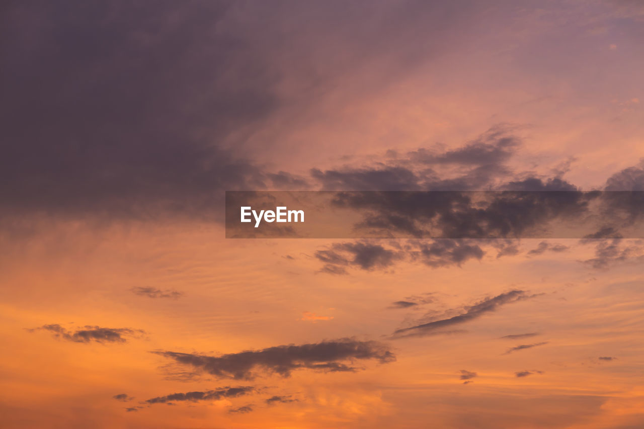 Low angle view of dramatic sky during sunset