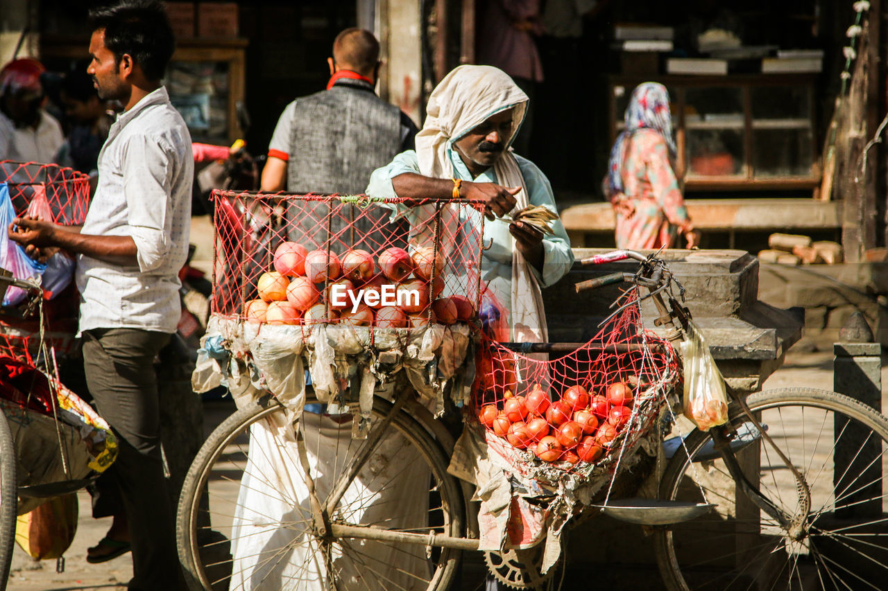 GROUP OF PEOPLE FOR SALE AT MARKET