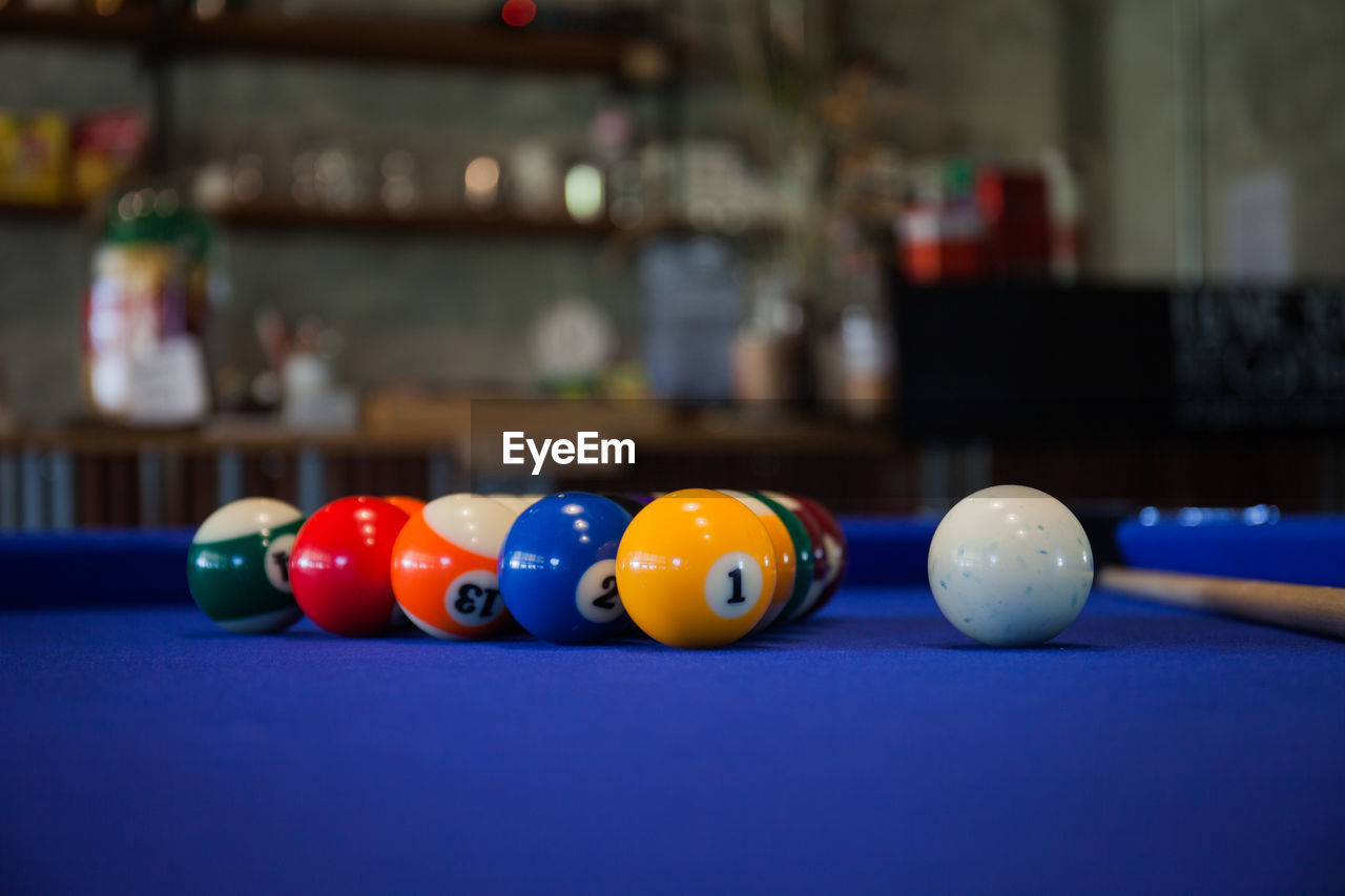 Close-up of balls on pool table