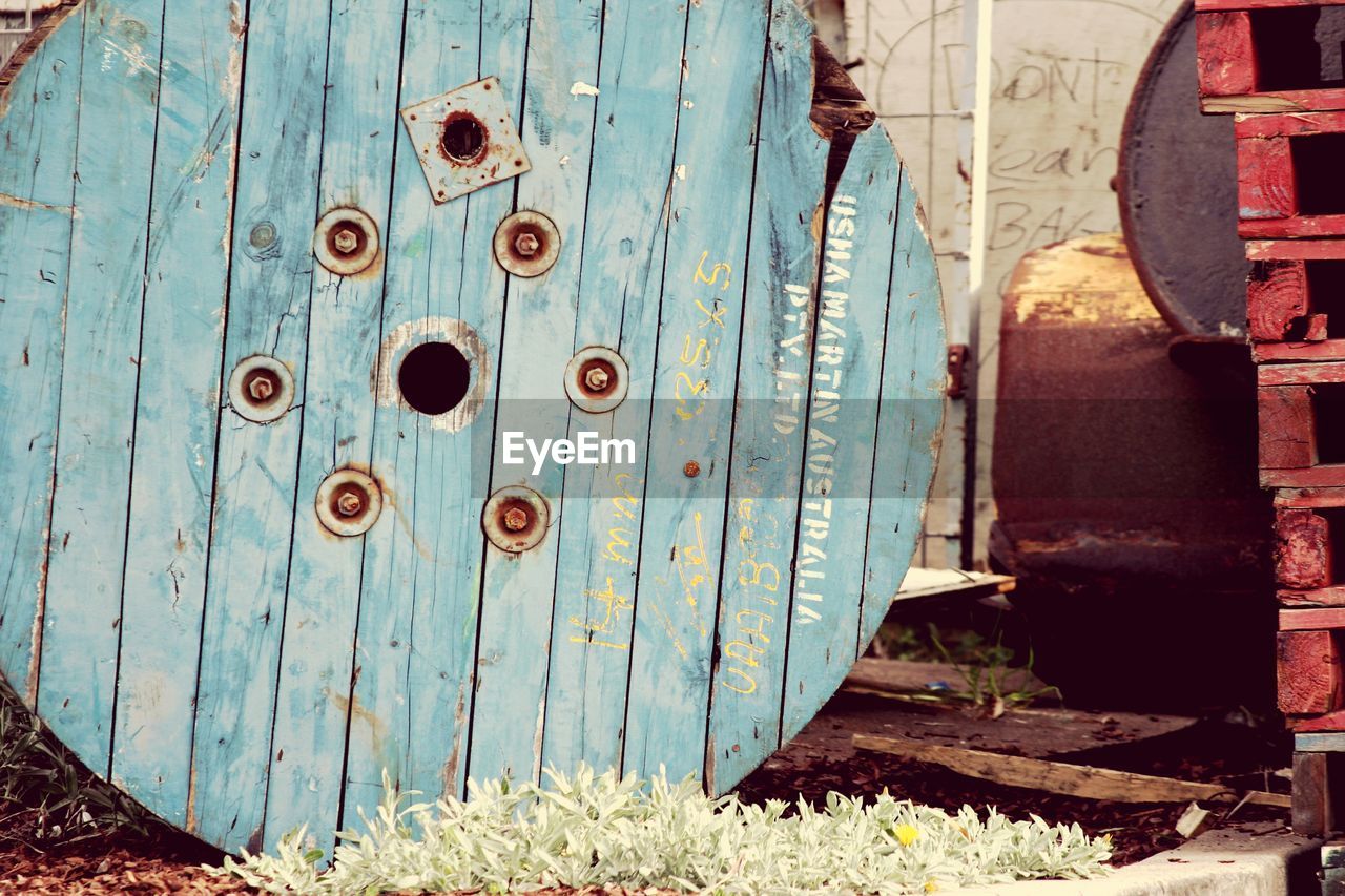 CLOSE-UP OF OLD RUSTY DOOR