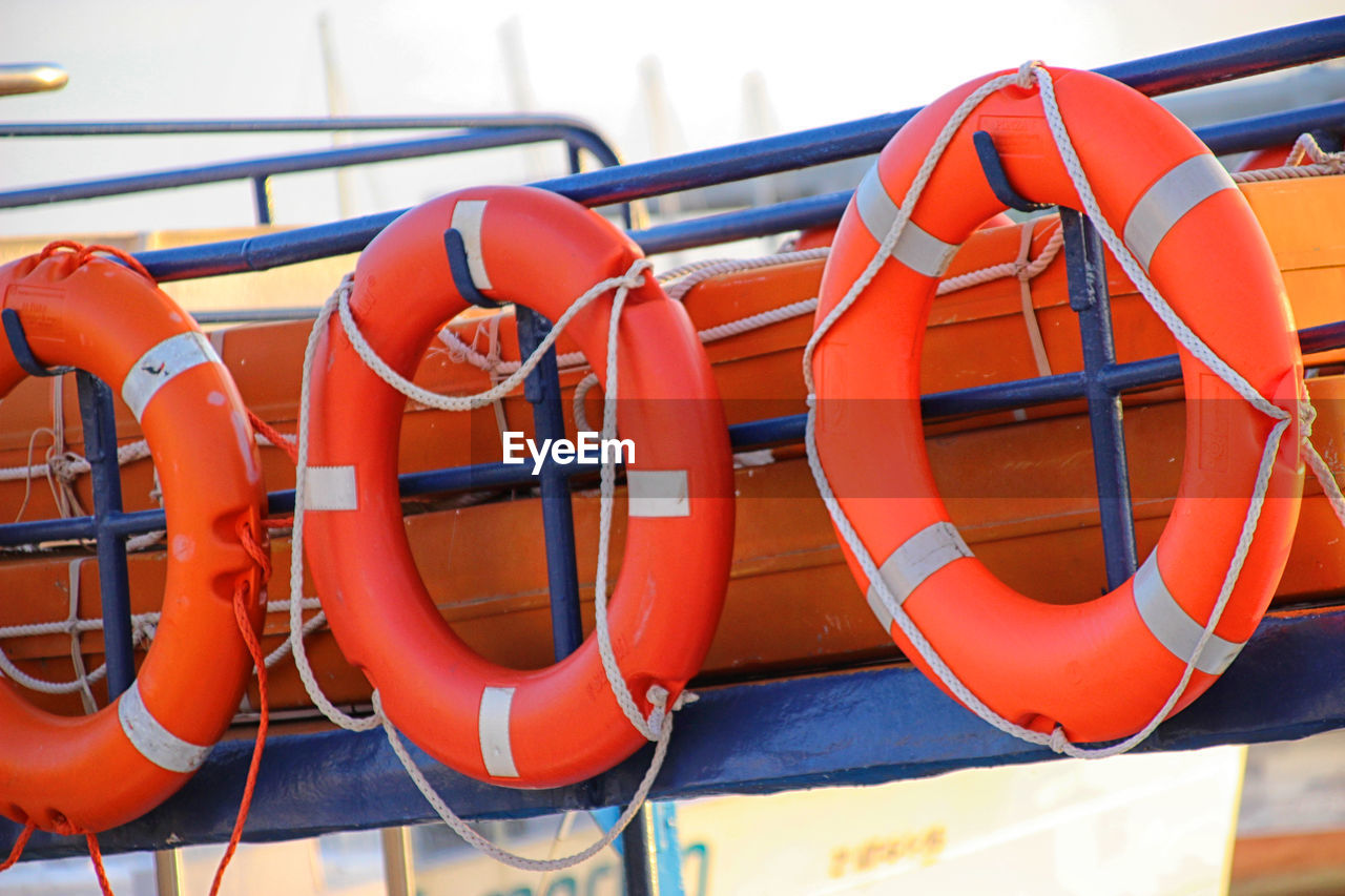 Life belts hanging on boat
