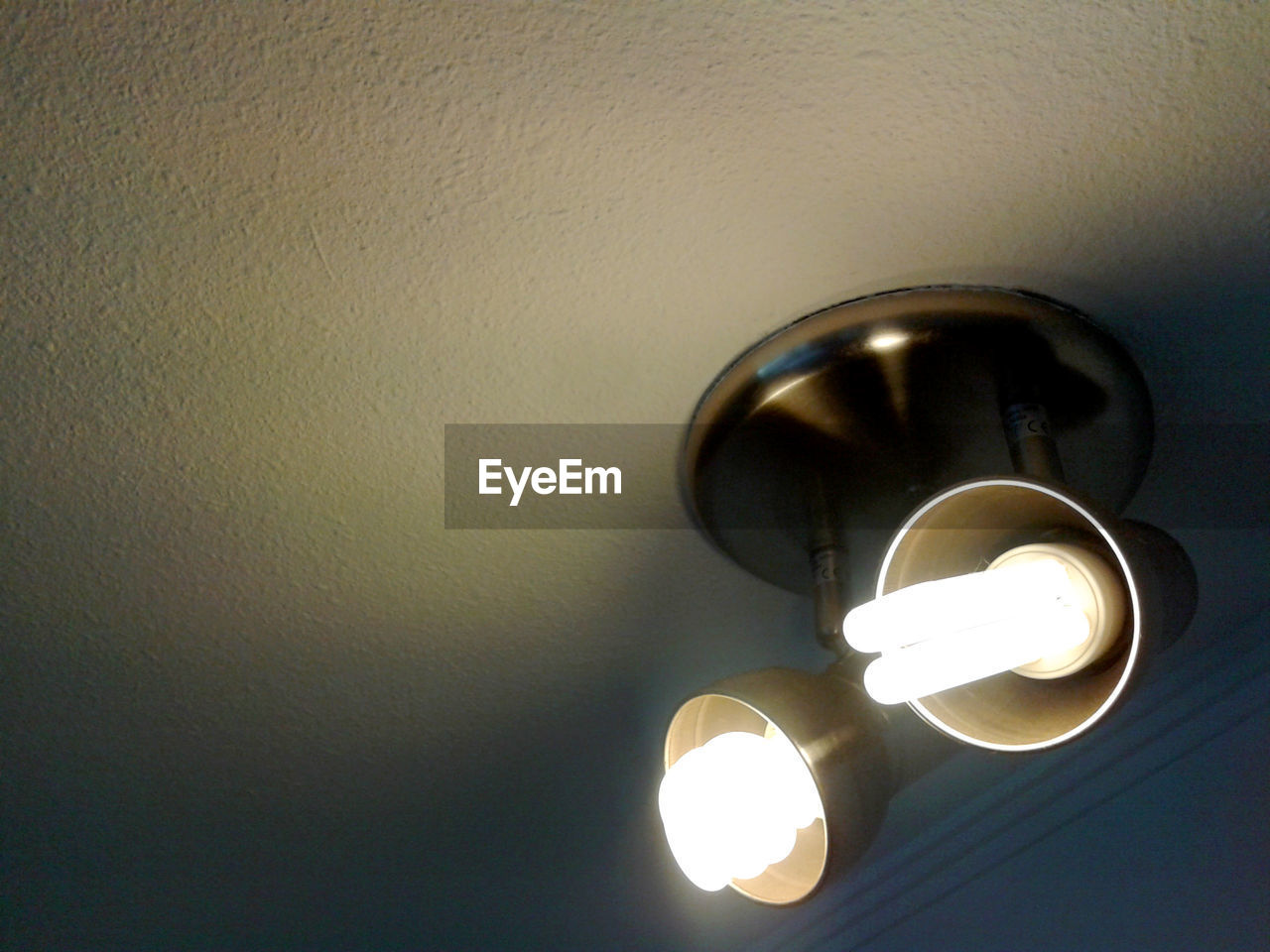 LOW ANGLE VIEW OF LIT LAMP