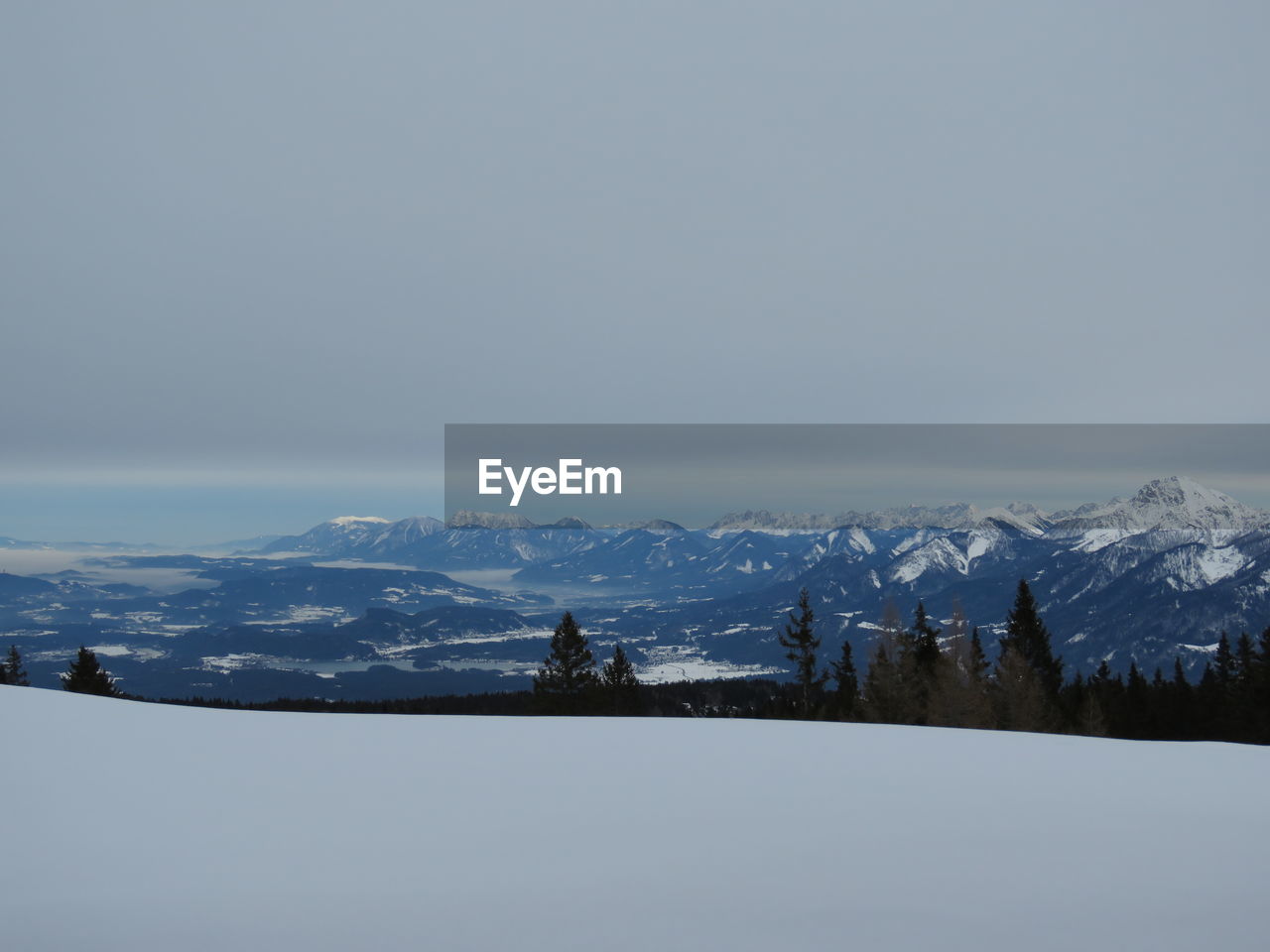 SCENIC VIEW OF SNOWCAPPED LANDSCAPE AGAINST SKY