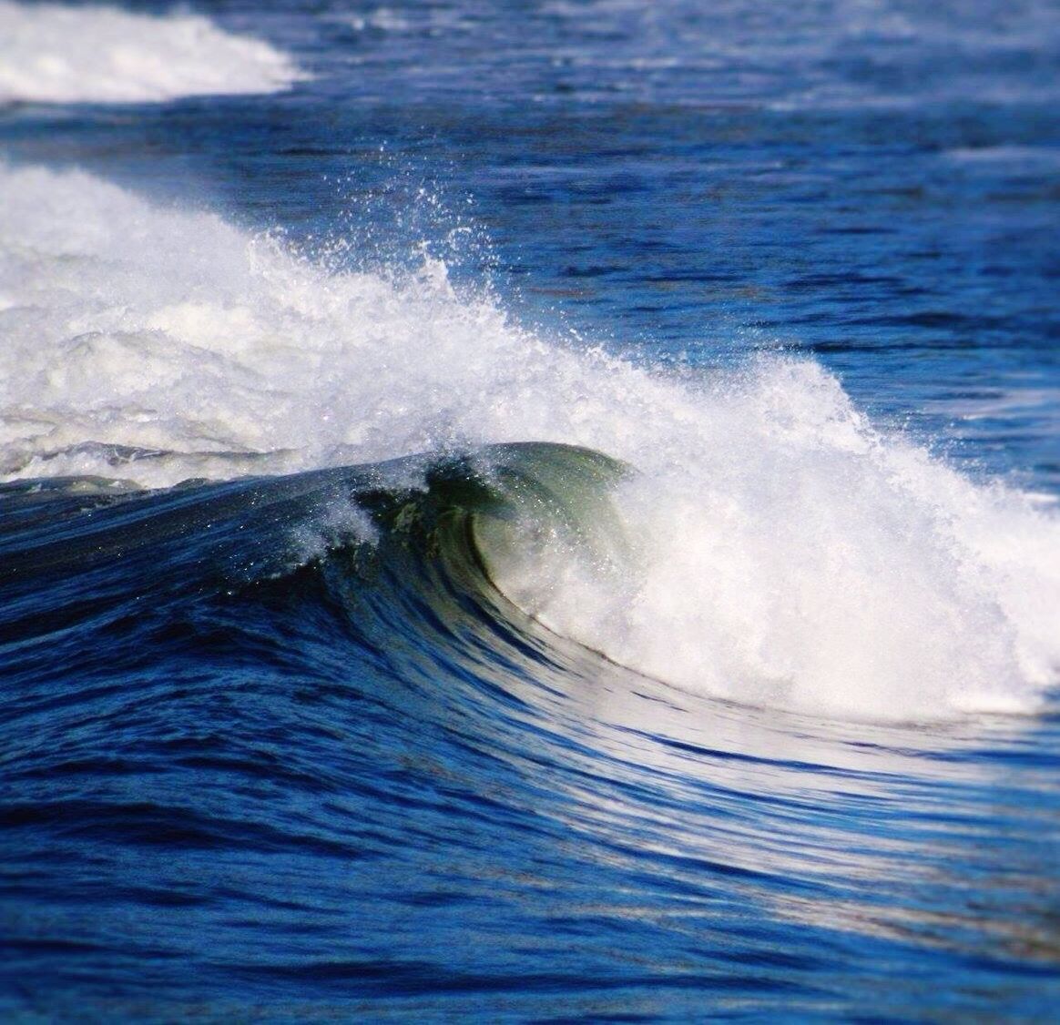 Sea waves rushing towards shore