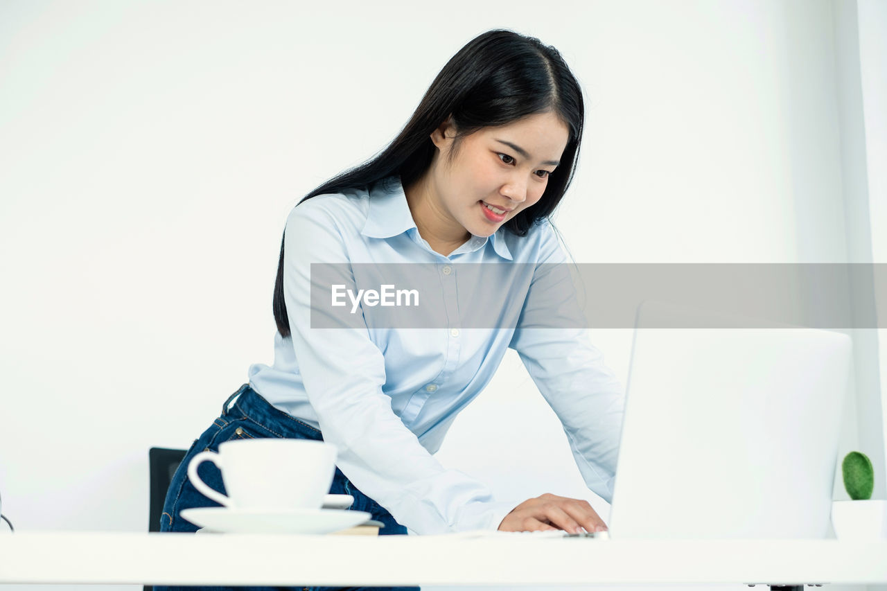 portrait of young businesswoman working at clinic