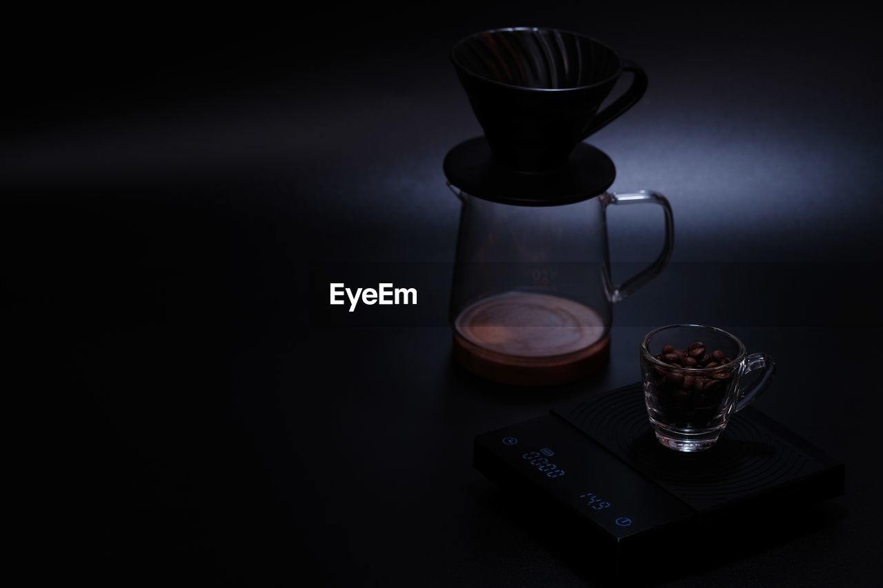 Hand drip coffee prepare coffee bean on digital scale.