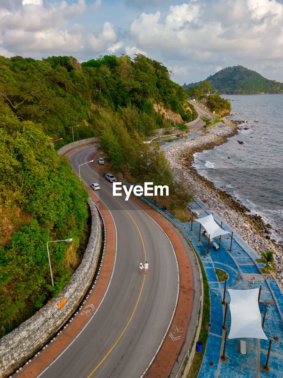 high angle view of road by lake against sky