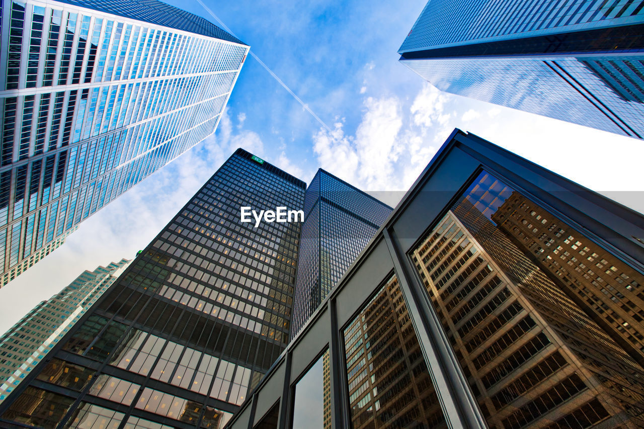 LOW ANGLE VIEW OF BUILDINGS AGAINST SKY