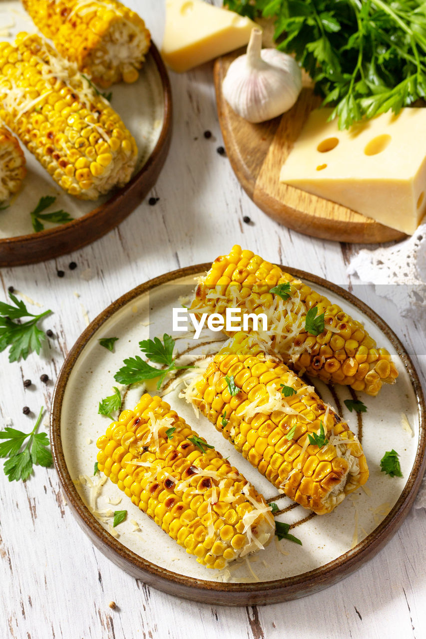 Summer dinner or snacks. idea for a barbecue or grill. mexican grilled corn with cheese. 
