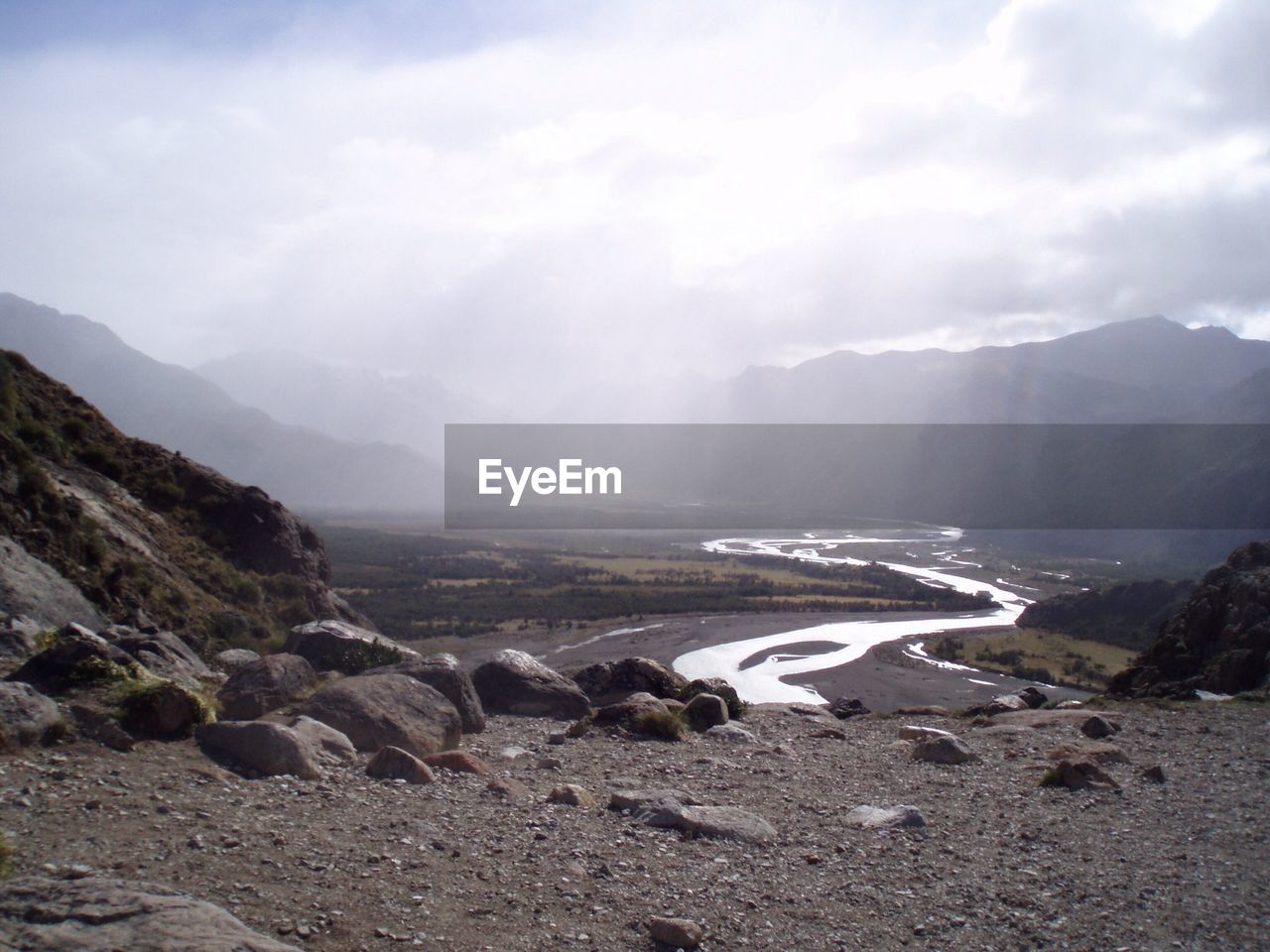 Scenic view of mountain covered with fog