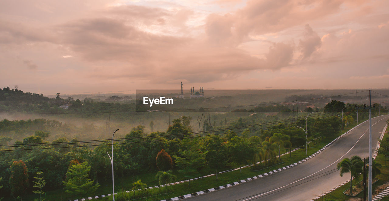 HIGH ANGLE VIEW OF ROAD AGAINST SKY