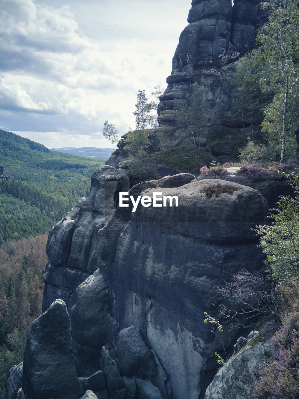 ROCK FORMATIONS ON LAND AGAINST SKY