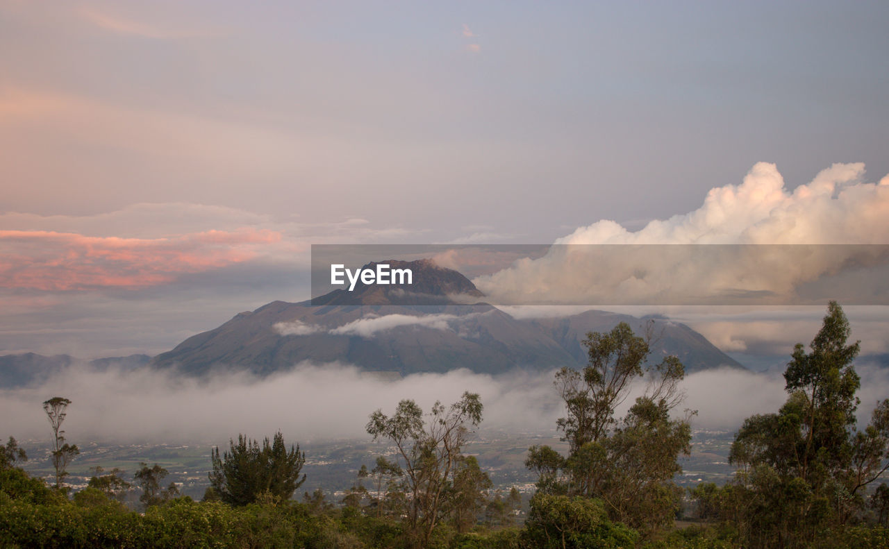 Scenic view of mountains against sky during sunset