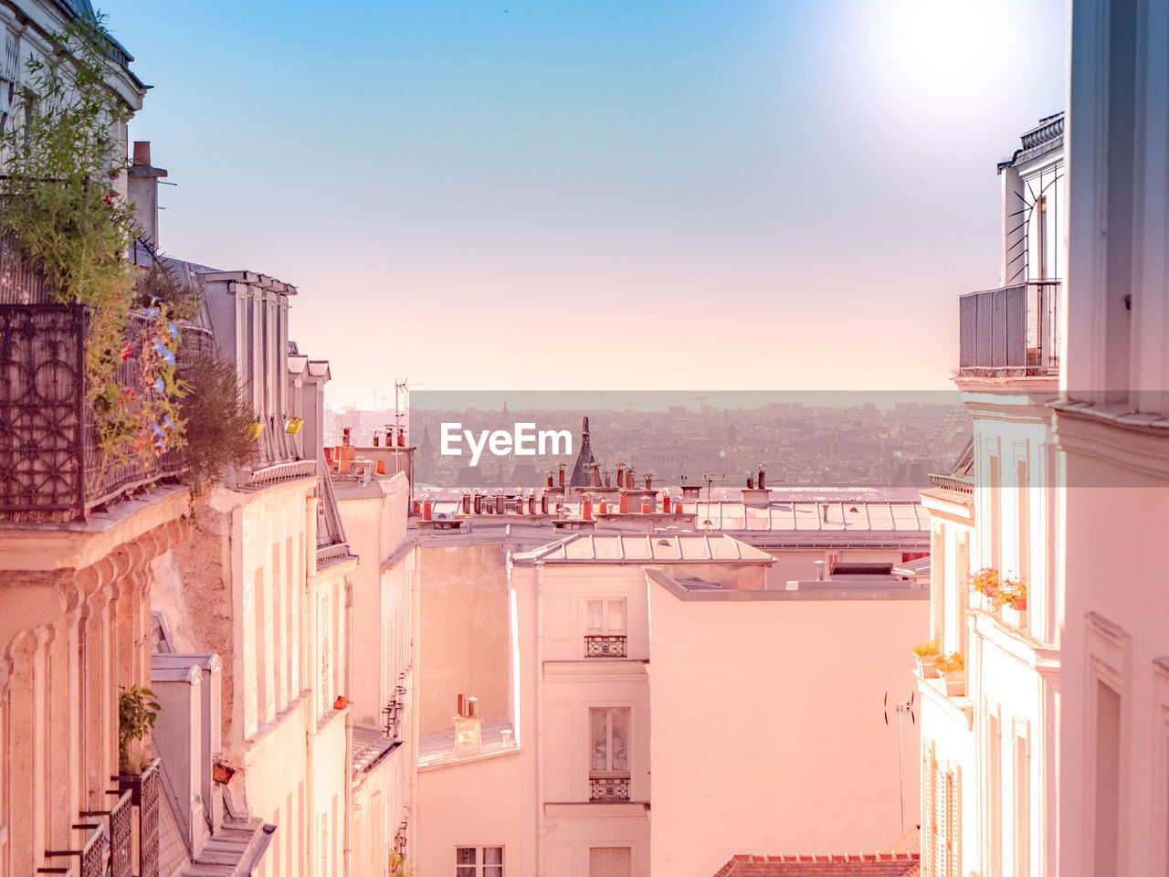 Panoramic view of buildings in city against clear sky