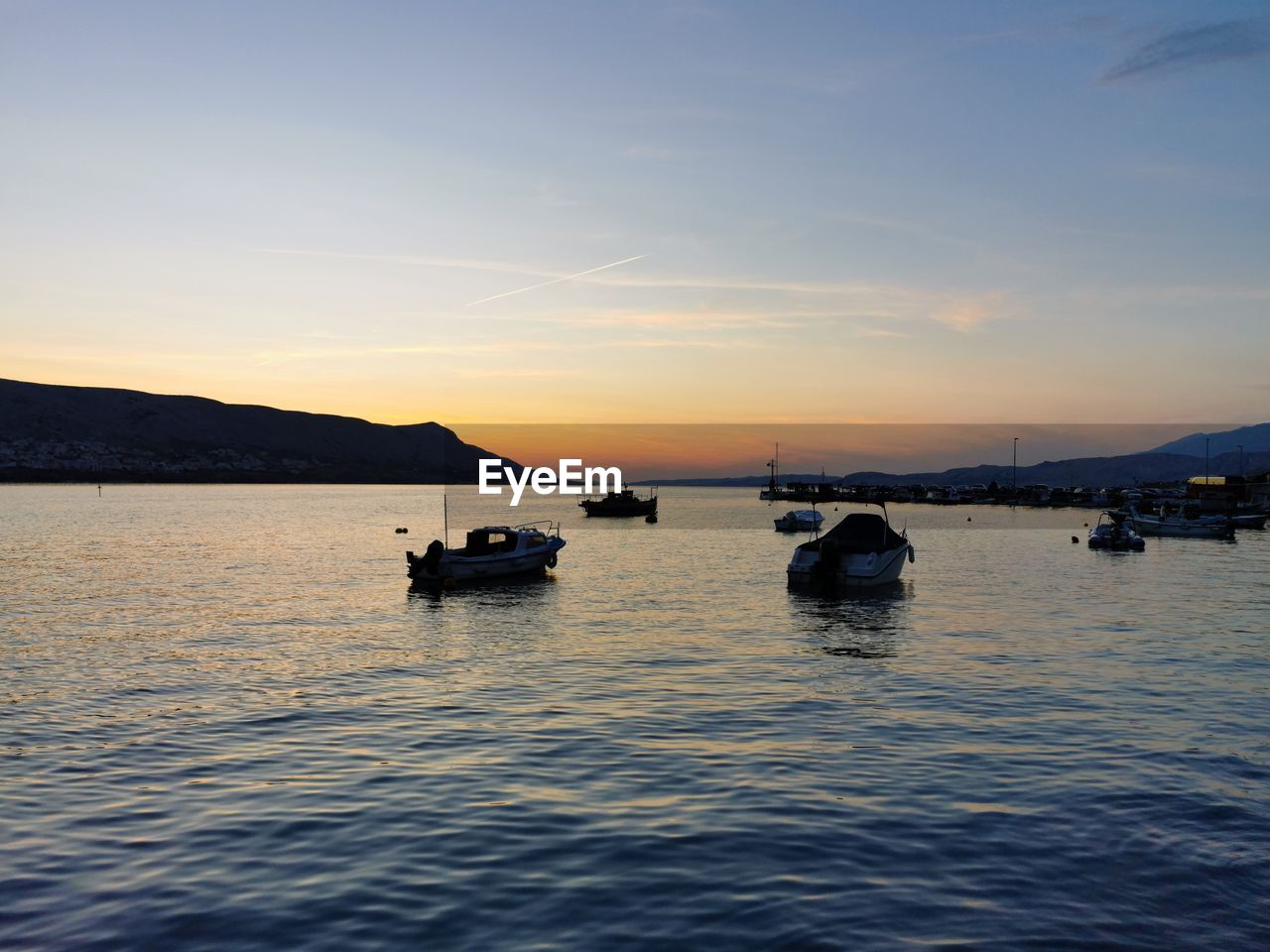 VIEW OF SEA AGAINST SKY DURING SUNSET
