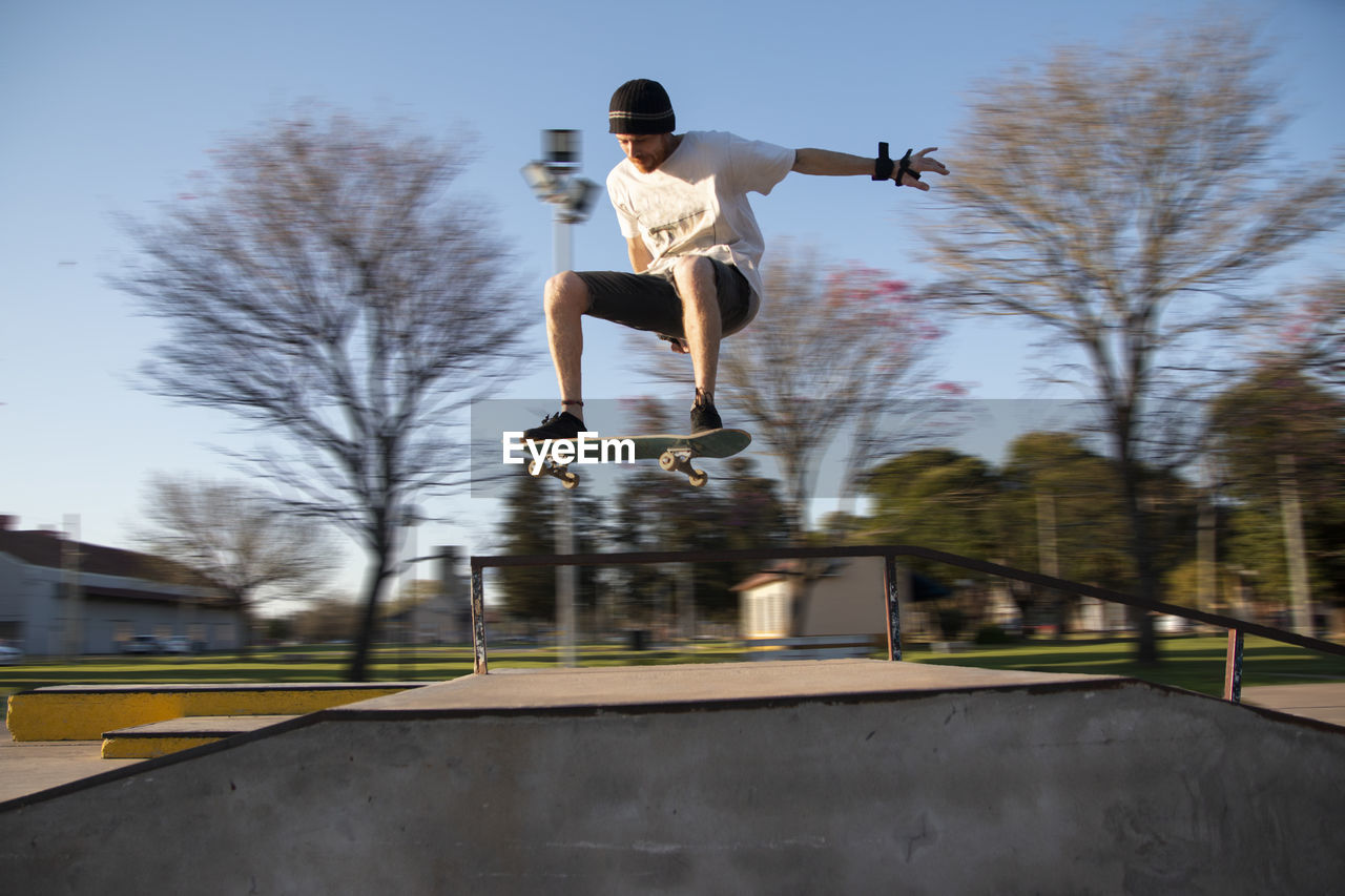 Full length of man jumping in park