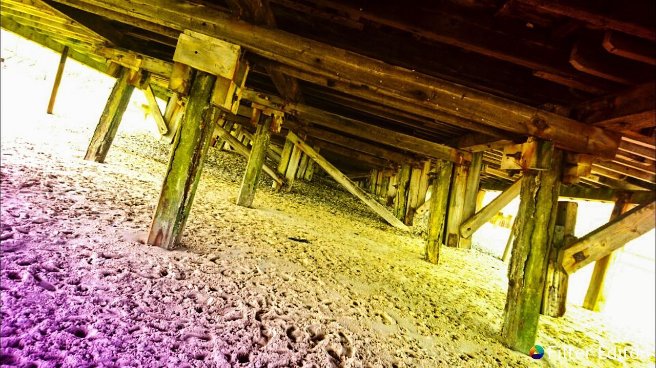 LOW ANGLE VIEW OF WOOD STRUCTURE