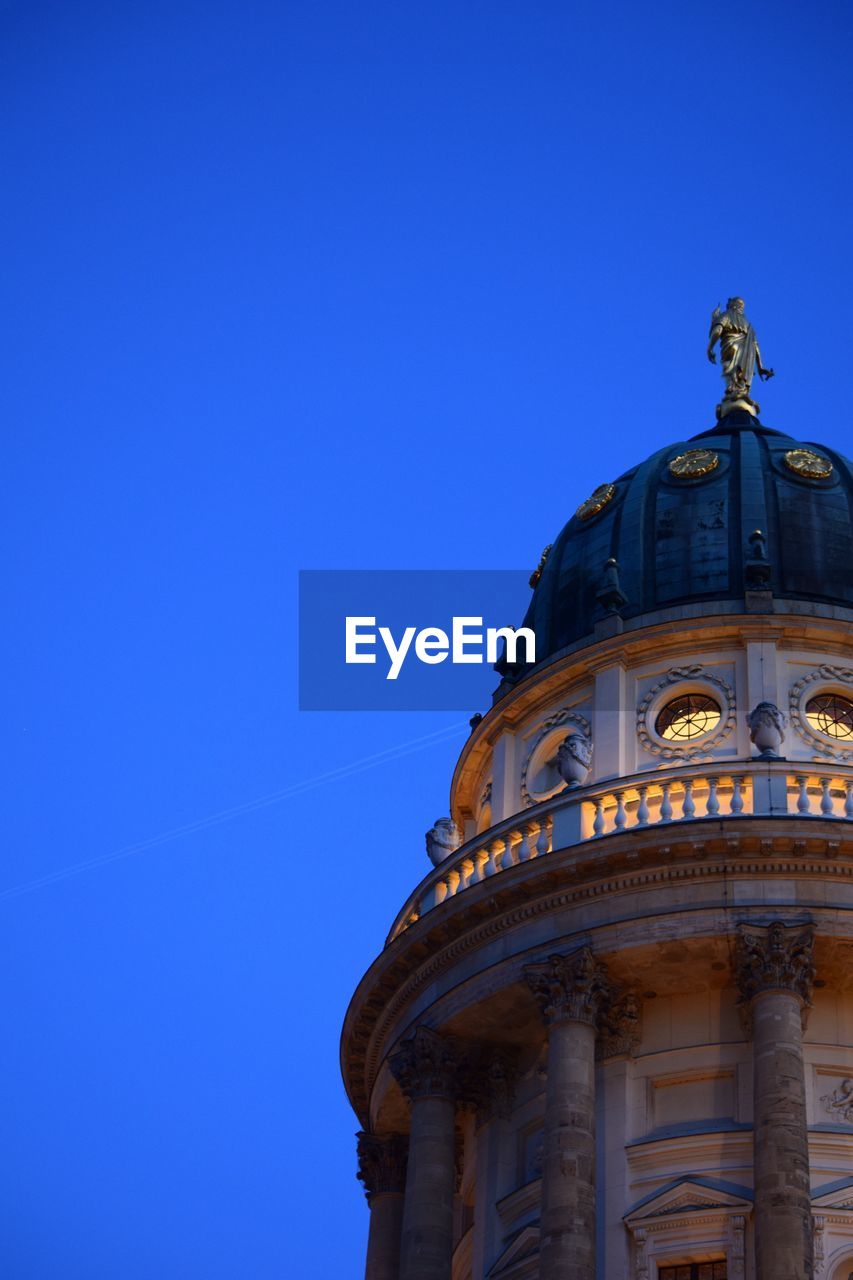 LOW ANGLE VIEW OF DOME AGAINST BLUE SKY