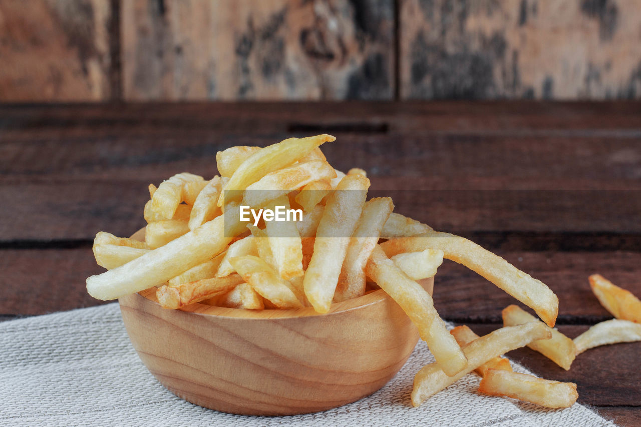 Close-up of french fries on table