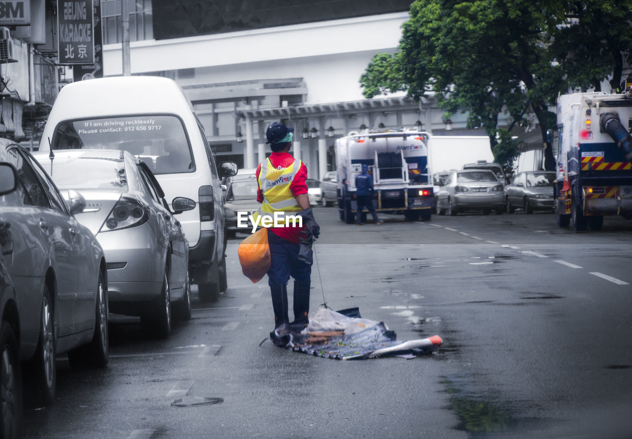 MAN WORKING IN BUS