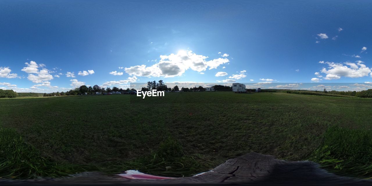 PANORAMIC SHOT OF FIELD AGAINST SKY