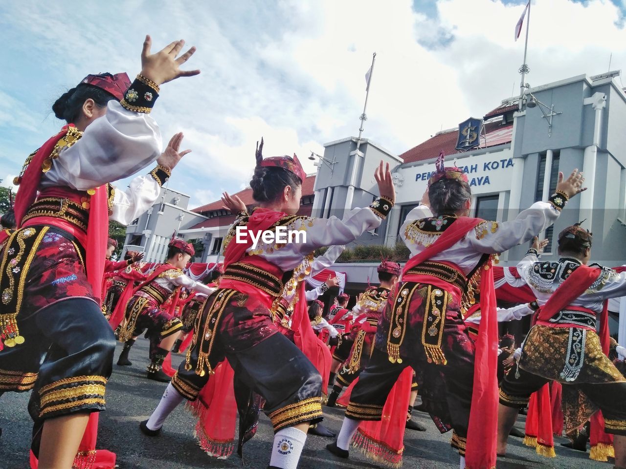 PANORAMIC VIEW OF PEOPLE IN TRADITIONAL CLOTHING