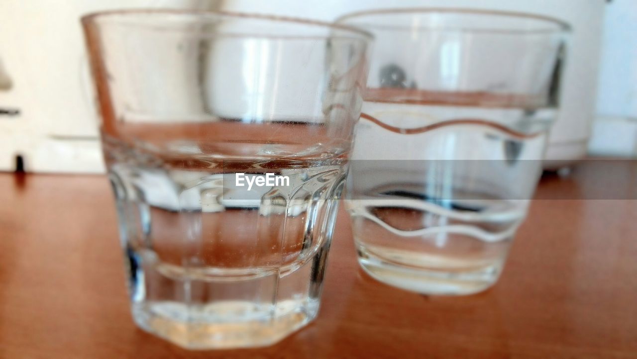 Drinking water in glasses on table