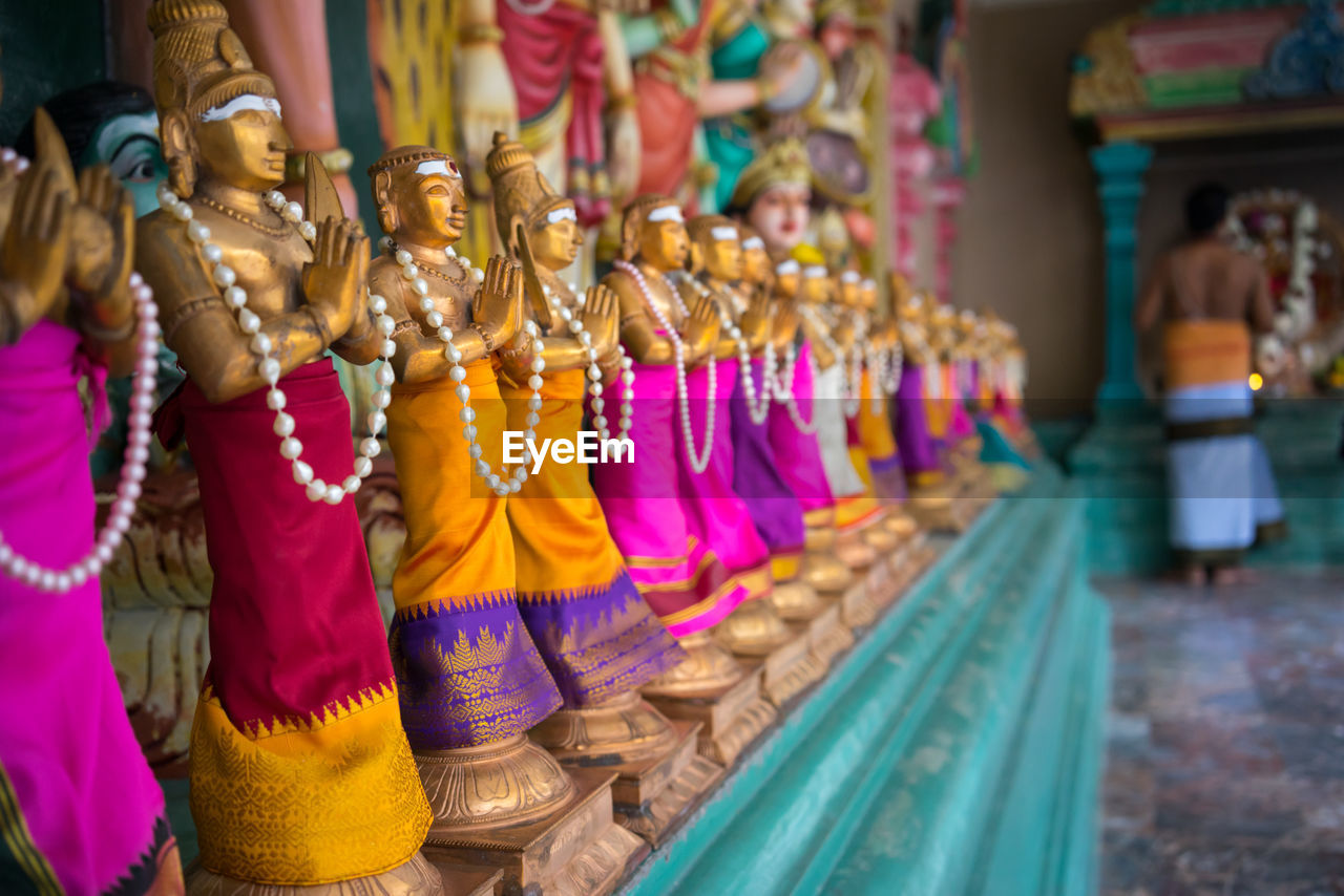 Small figure statues in sri maha mariamman temple dhevasthanam near downtown kuala lumpur, malaysia.