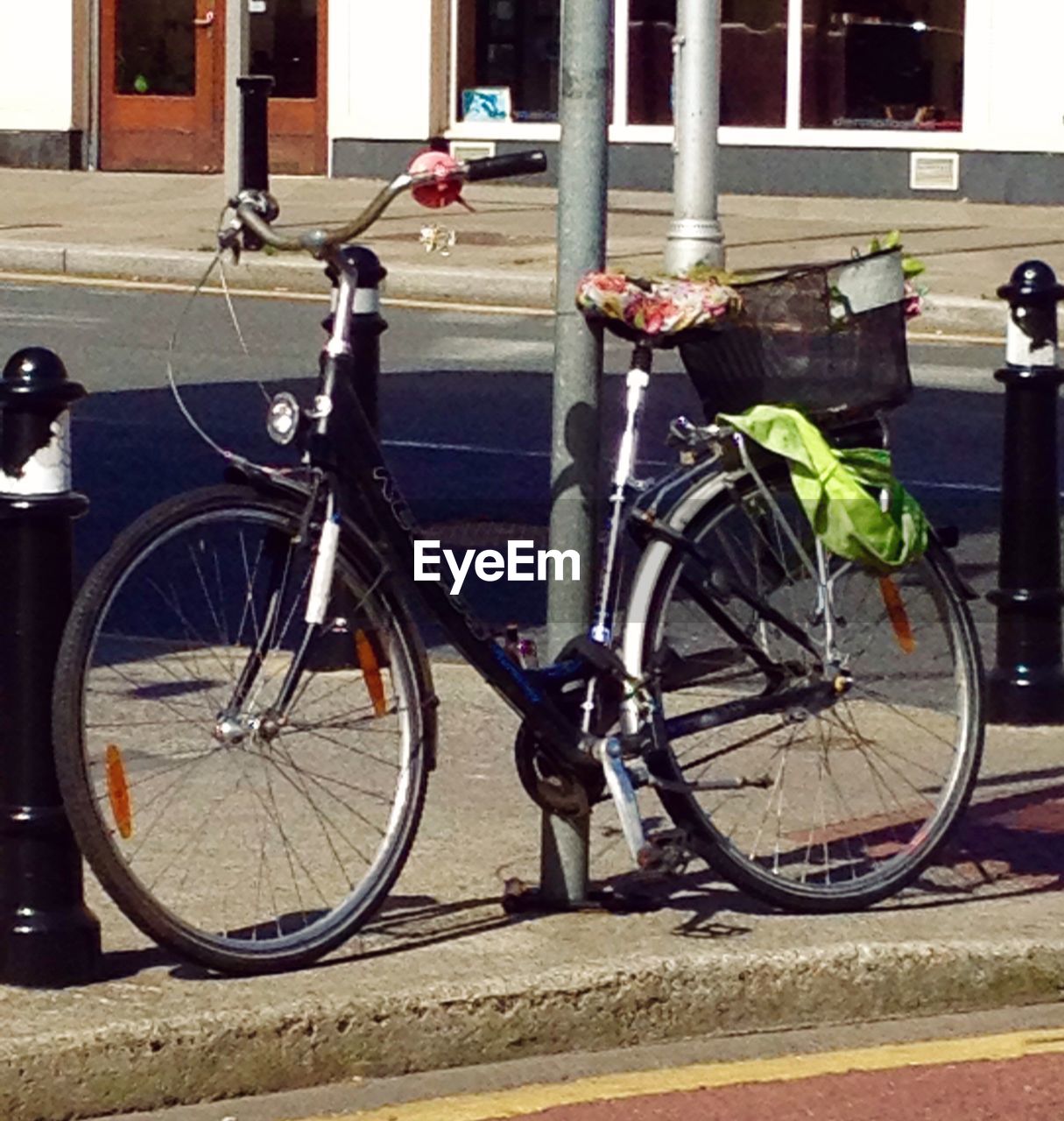 BICYCLES PARKED IN FRONT OF BUILDING