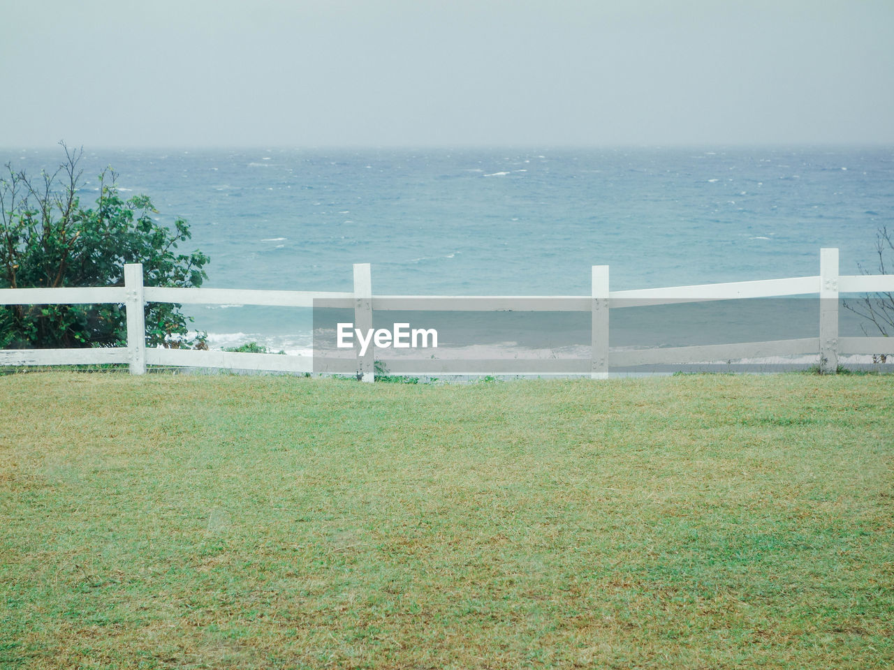 Scenic view of sea against blue sky