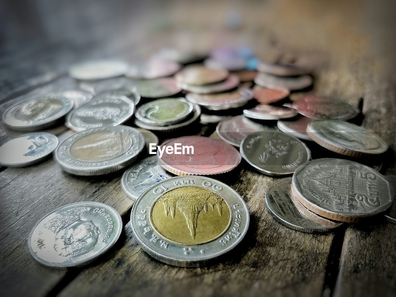 Close-up of coins on table