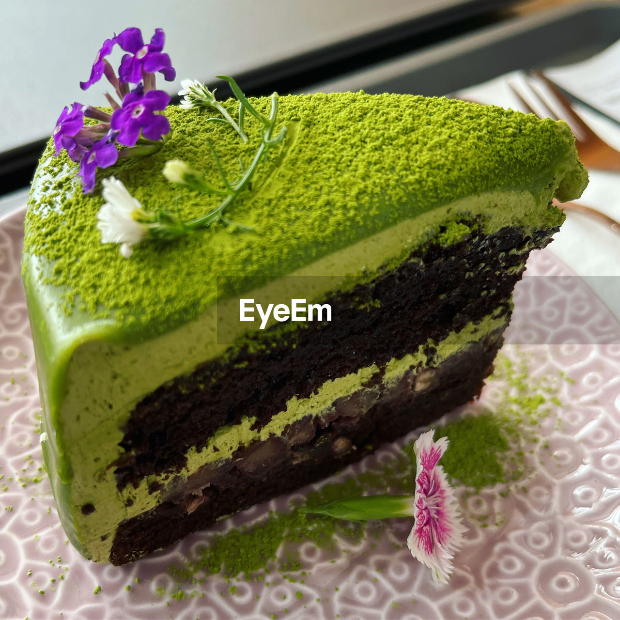 birthday cake, food, food and drink, dessert, sweet food, sweet, freshness, cake, green, baked, icing, flower, indoors, chocolate cake, no people, flowering plant, close-up, plant, temptation, produce, plate, healthy eating, chocolate, still life, fruit, slice