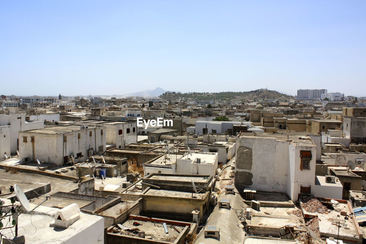 High angle view of abandoned architectural structures against clear sky