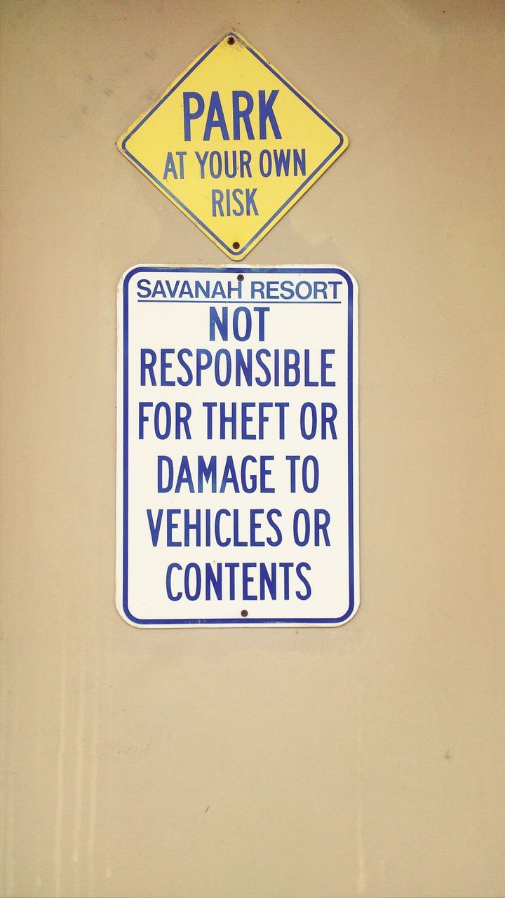 Close-up of warning sign on the wall
