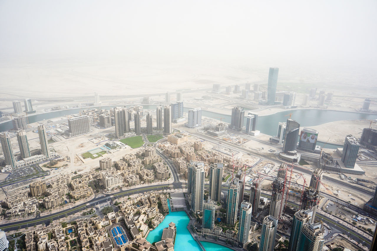 Aerial view of cityscape during sand storm