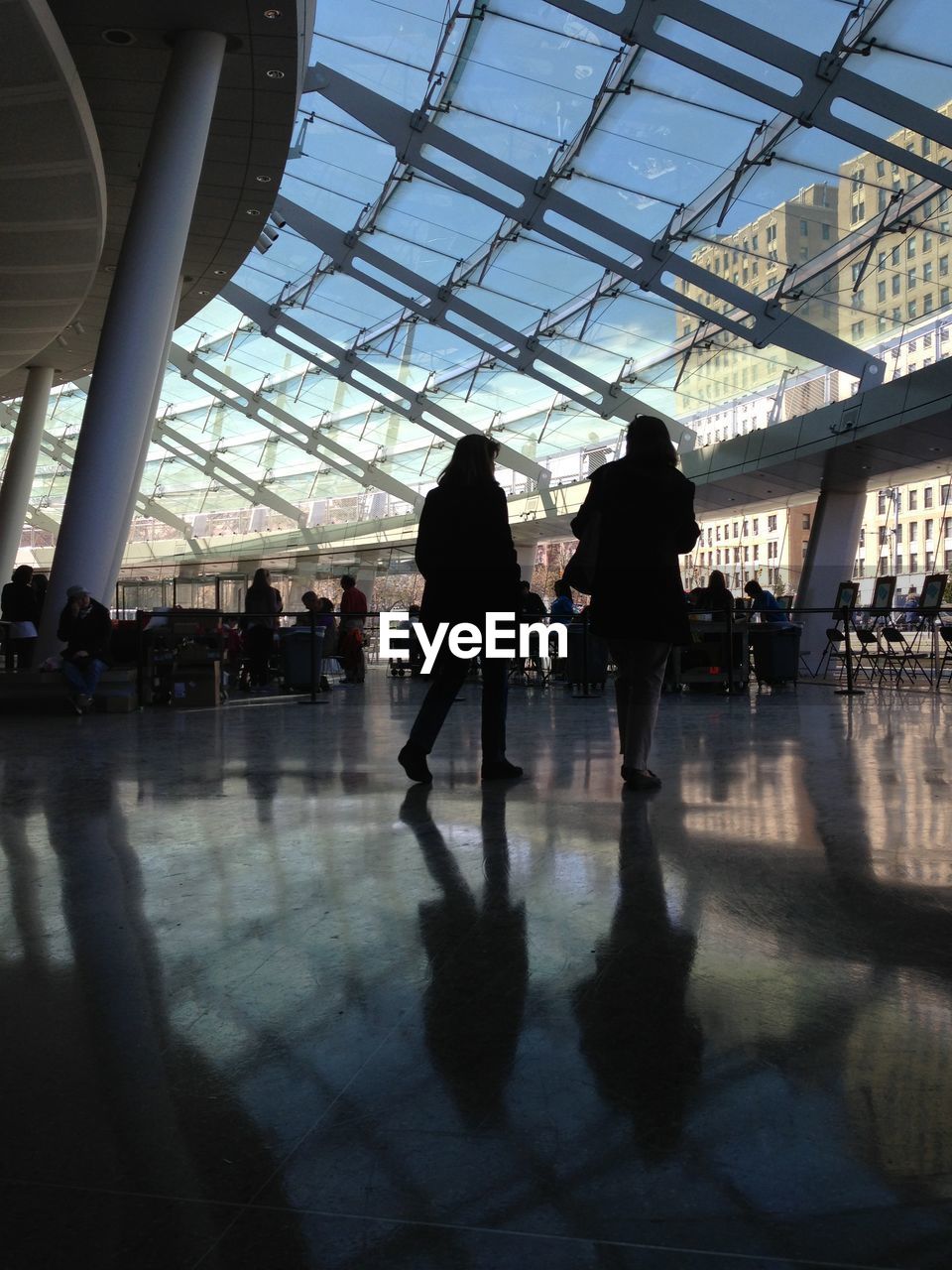 Women walking in modern built structure