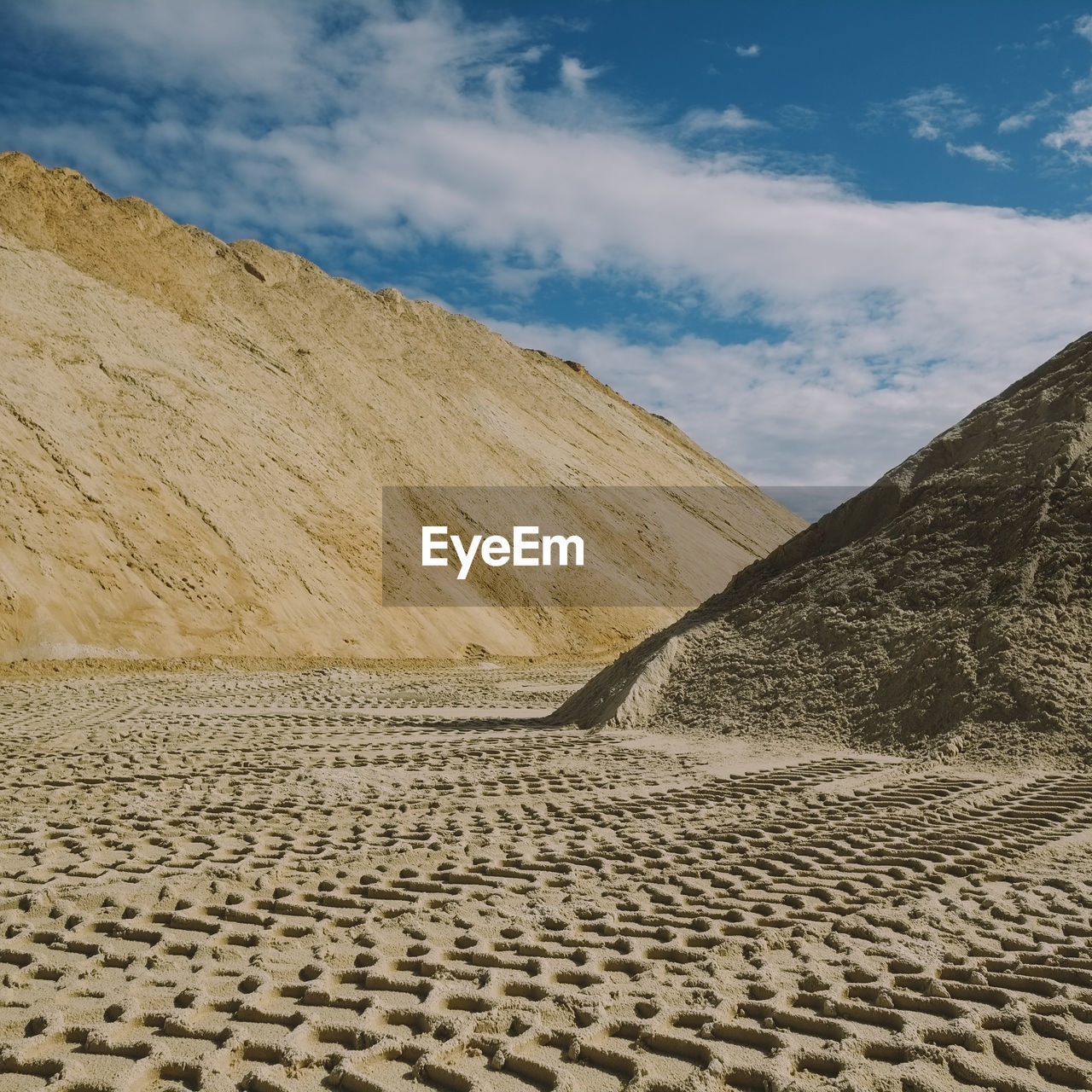 Slag heaps with tire tracks