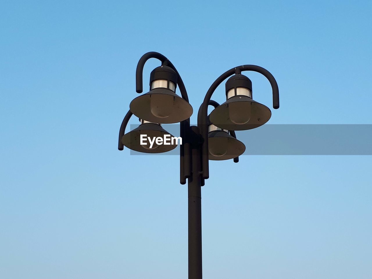 Low angle view of street light against clear sky