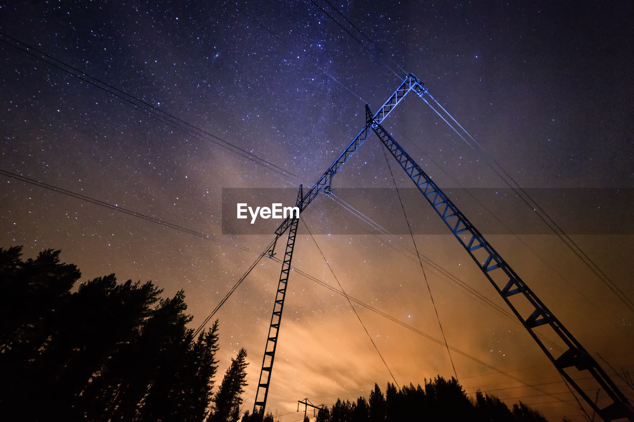 LOW ANGLE VIEW OF SILHOUETTE ELECTRICITY PYLON AGAINST SKY